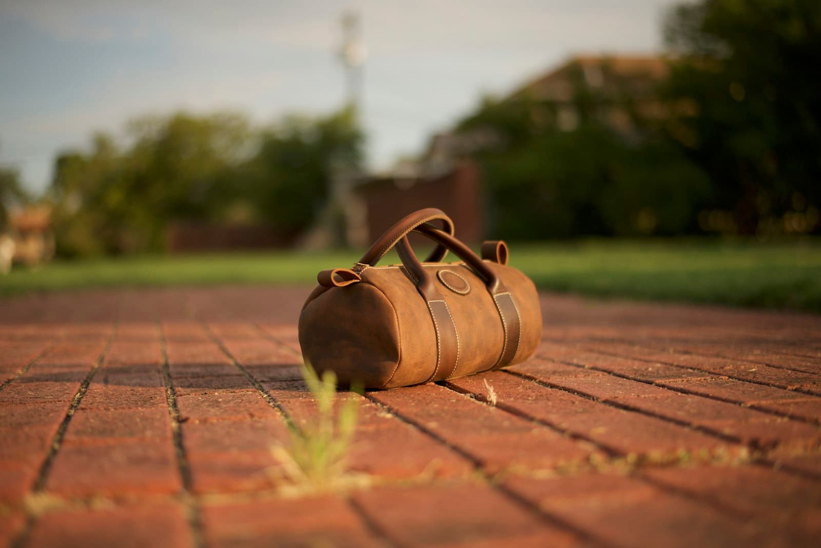 Handcrafted brown leather duffel bag with refined finish